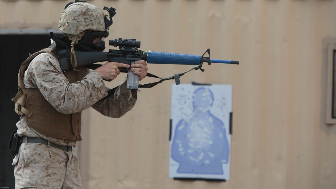 Sgt. Justin A. Potts, a platoon sergeant with Company C, 6th Engineer Support Battalion, 4th Marine Logistics Group, Marine Forces Reserve, fires 9mm Simunition rounds at a target in preparation for an urban assault training event during exercise Red Dagger at Fort Indiantown Gap, Penn., June 13, 2016. Exercise Red Dagger is a bilateral training exercise that gives Marines an opportunity to exchange tactics, techniques and procedures as well as build working relationships with their British counterparts. 