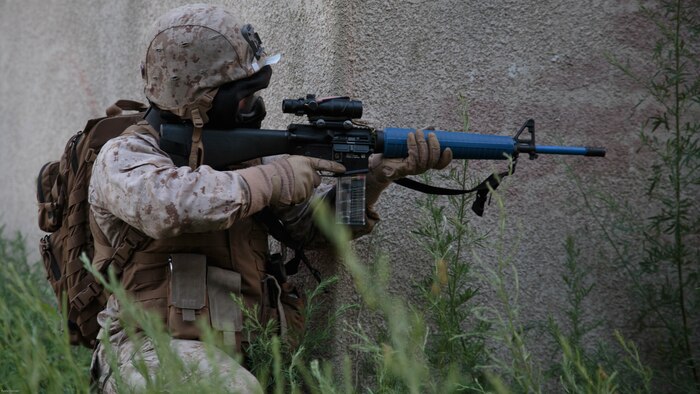 Sgt. Nicholas A. Skaggs, a platoon sergeant with Company C, 6th Engineer Support Battalion, 4th Marine Logistics Group, Marine Forces Reserve, provides security on a building during a simulated raid on an urban compound during exercise Red Dagger at Fort Indiantown Gap, Penn., June 13, 2016. Exercise Red Dagger is a bilateral training exercise that gives Marines an opportunity to exchange tactics, techniques and procedures as well as build working relationships with their British counterparts. 