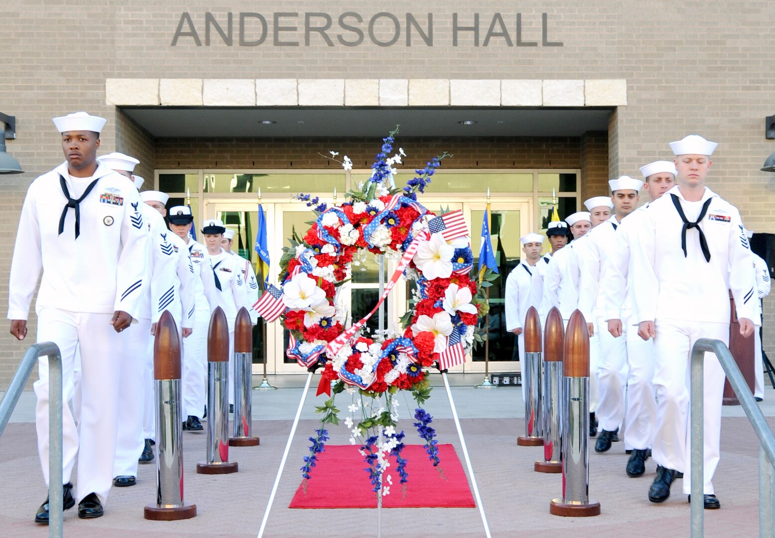 Sailors from Navy Medicine Training Support Center post as “side boys” at a ceremony to commemorate the Battle of Midway June 7
outside of Anderson Hall on Joint Base San Antonio-Fort Sam Houston. “Side boys” are a part of the quarterdeck ceremonies when an
important person or officer comes on board or leaves a ship.