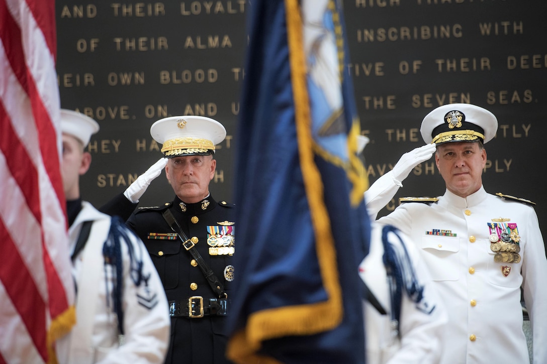 Marine Corps Gen. Joe Dunford, left, chairman of the Joint Chiefs of Staff, and Navy Adm. Mark E. Ferguson render honors at the U.S. Naval Academy in Annapolis, Md., June 16, 2016. DoD photo by Navy Petty Officer 2nd Class Dominique A. Pineiro