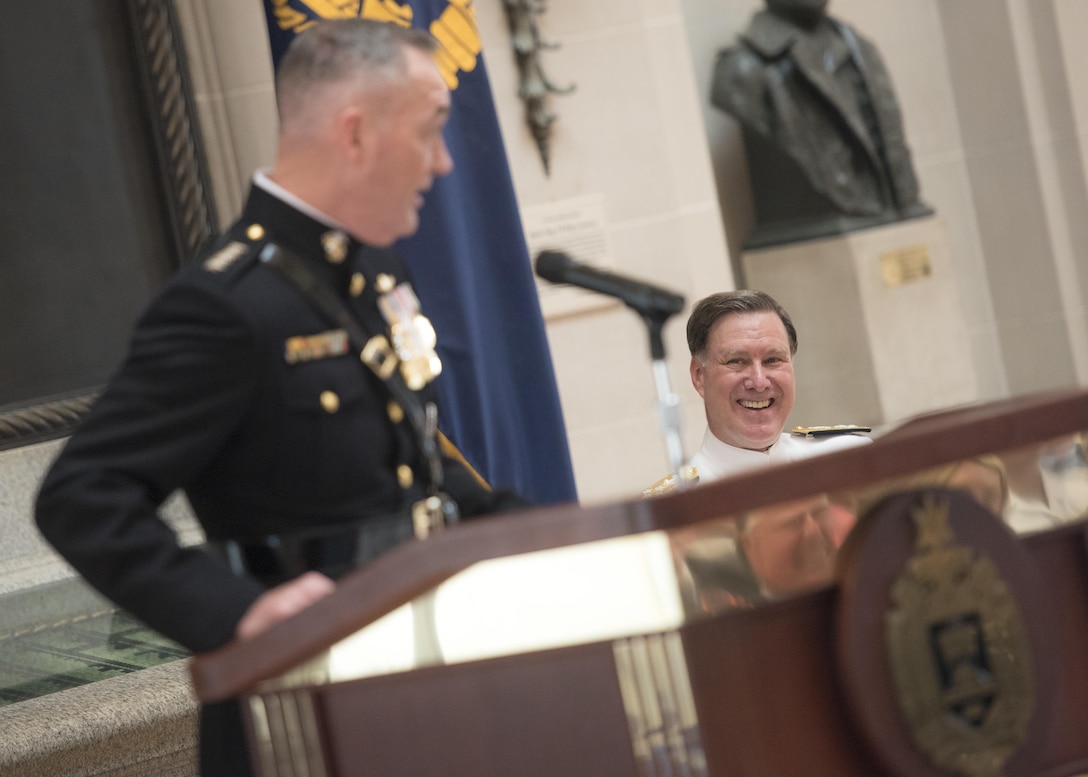 Navy Adm. Mark E. Ferguson listens to remarks from Marine Corps Gen. Joe Dunford, left, chairman of the Joint Chiefs of Staff, during Ferguson's retirement ceremony at the U.S. Naval Academy in Annapolis, Md., June 16, 2016. DoD photo by Navy Petty Officer 2nd Class Dominique A. Pineiro