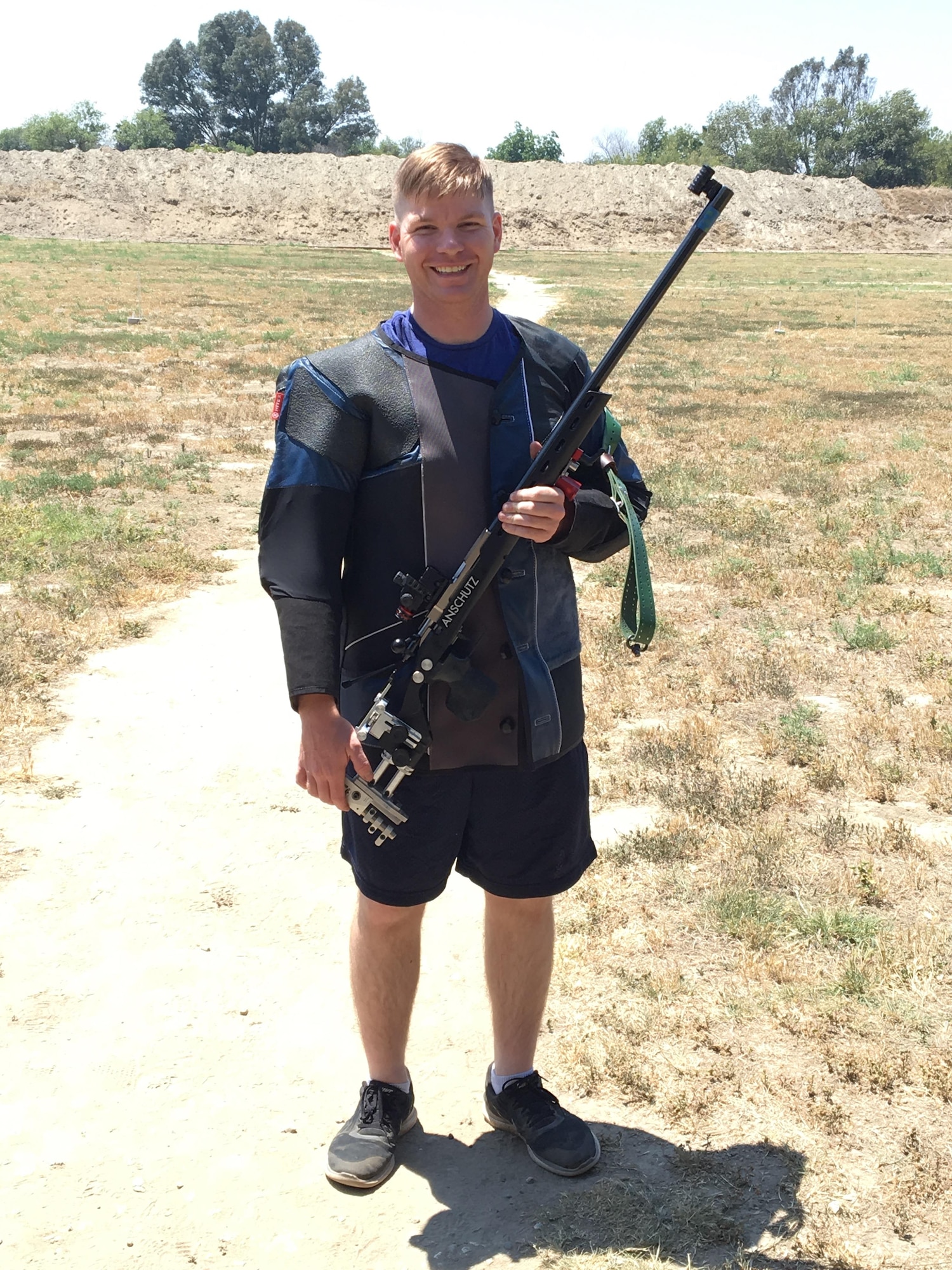 Staff Sgt. Cameron Keating holds his small-bore rifle during the California Rifle and Pistol Association 2016 Open and Junior 3200 Metric Small Bore Conventional Prone State Championships on June 5. (U.S. Air Force photo/Lt. Col. Mark Gould/released)