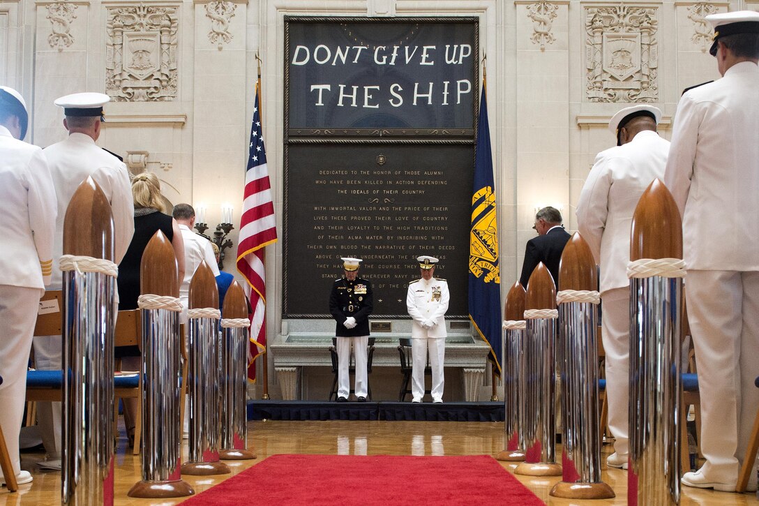 Marine Corps Gen. Joe Dunford, left, chairman of the Joint Chiefs of Staff, and Navy Adm. Mark E. Ferguson pause for a moment of silence during Ferguson's retirement ceremony at the U.S. Naval Academy in Annapolis, Md., June 16, 2016. DoD photo by Navy Petty Officer 2nd Class Dominique A. Pineiro