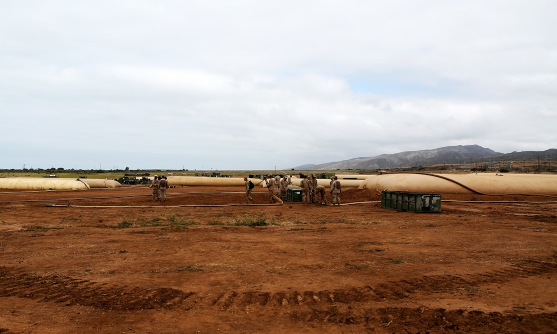 Bulk fuel and water purification Marines from 6th Engineer Support Battalion, 4th Marine Logistics Group, maintain nearly a million gallons of purified water during an annual training exercise aboard Camp Pendleton, Calif., June 13, 2016 to increase readiness and fulfill their yearly requirements as a reserve unit. 7th ESB, 1st Marine Logistics Group, supported their reserve counterparts with the gear necessary to pump water nearly 3 miles from the ocean at Red Beach to a training area where they practiced setting up and maintaining massive stores of water. (U.S. Marine Corps photo by Sgt. Carson Gramley/released)