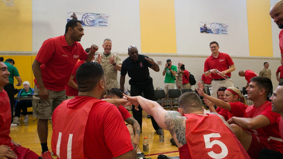 Sgt. Maj. of the Marine Corps Ronald L. Green gives a pep talk to members of Team Marine Corps during a 2016 Department of Defense (DoD) Warrior Games sitting volleyball match at the U.S. Military Academy at West Point, N.Y., June 13, 2016. The 2016 DoD Warrior Games is an adaptive sports competition for wounded, ill and injured Service members and veterans from the U.S. Army, Marine Corps, Navy, Air Force, Special Operations Command and the British Armed Forces. 
