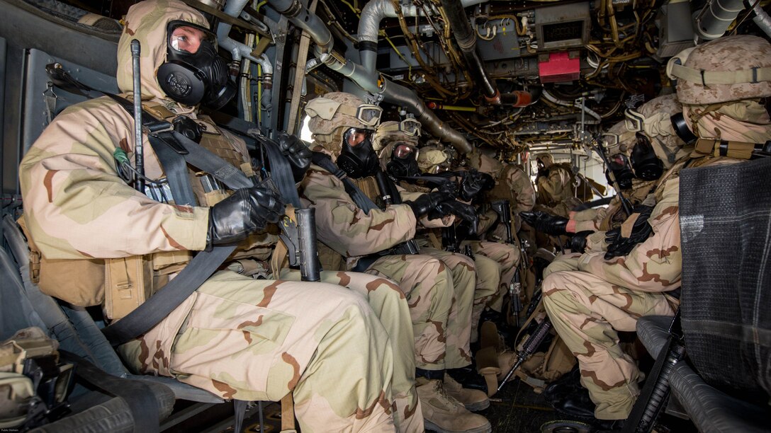 U.S. Marines with Weapons Platoon, Fox Company, 2nd Battalion, 7th Marine Regiment, Special Purpose Marine Air-Ground Task Force-Crisis Response-Central Command 16.2, conduct Chemical, Biological, Radiological and Nuclear Defense Training at an undisclosed location in Southwest Asia, May 03, 2016. SPMAGTF-CR-CC is forward deployed in several host nations, with the ability to respond to a variety of contingencies rapidly and effectively. 