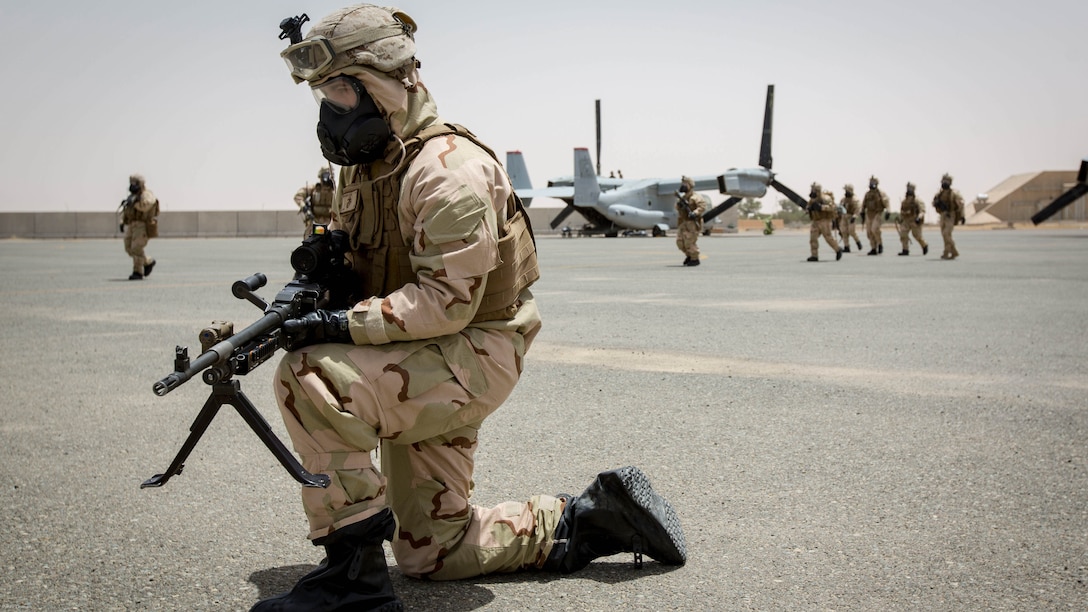 A U.S. Marine with Weapons Platoon, Fox Company, 2nd Battalion, 7th Marine Regiment, Special Purpose Marine Air-Ground Task Force-Crisis Response-Central Command 16.2, posts security during Chemical, Biological, Radiological and Nuclear Defense Training at an undisclosed location in Southwest Asia, May 03, 2016. SPMAGTF-CR-CC is forward deployed in several host nations, with the ability to respond to a variety of contingencies rapidly and effectively. 