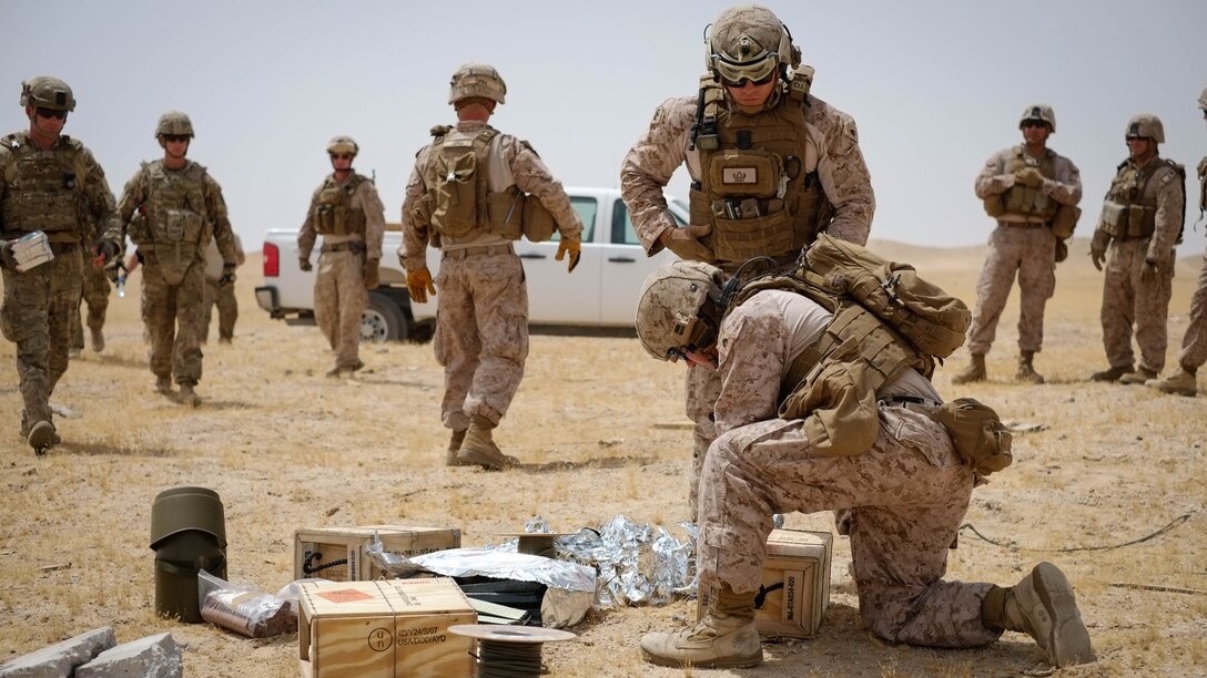 Explosive Ordnance Disposal Marines with Special Purpose Marine Air Ground Task Force - Crisis Response - Central Command 16.2, Soldiers with the 797th Ordnance Co., 79th Ordnance Bn., and Airmen with the 332nd Expeditionary Civil Engineer Squadron and the 386th ECES, perform combined explosive effects training at an undisclosed location in Southwest Asia, May 10, 2016. SPMAGTF-CR-CC is forward deployed in several host nations, with the ability to respond to a variety of contingencies rapidly and effectively. 