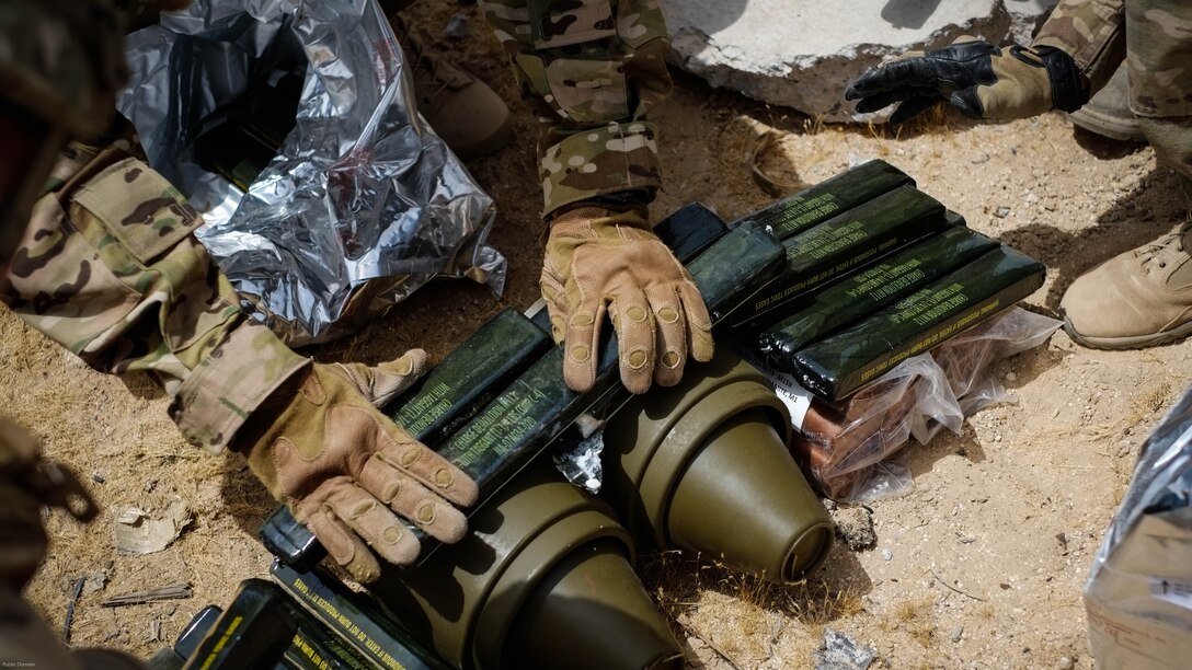 Explosive Ordnance Disposal Marines with Special Purpose Marine Air Ground Task Force - Crisis Response - Central Command 16.2, Soldiers with the 797th Ordnance Co., 79th Ordnance Bn., and Airmen with the 332nd Expeditionary Civil Engineer Squadron and the 386th ECES, perform combined explosive effects training at an undisclosed location in Southwest Asia, May 10, 2016. SPMAGTF-CR-CC is forward deployed in several host nations, with the ability to respond to a variety of contingencies rapidly and effectively. 