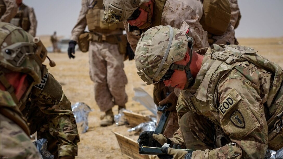 Explosive Ordnance Disposal Marines with Special Purpose Marine Air Ground Task Force - Crisis Response - Central Command 16.2, Soldiers with the 797th Ordnance Co., 79th Ordnance Bn., and Airmen with the 332nd Expeditionary Civil Engineer Squadron and the 386th ECES, perform combined explosive effects training at an undisclosed location in Southwest Asia, May 10, 2016. SPMAGTF-CR-CC is forward deployed in several host nations, with the ability to respond to a variety of contingencies rapidly and effectively. 