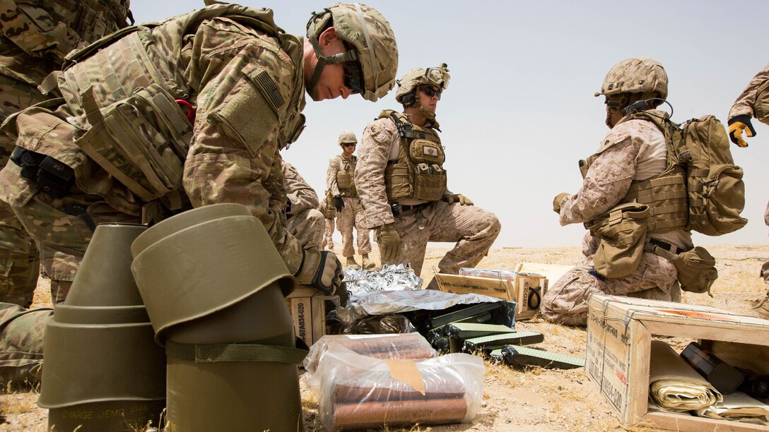 Explosive Ordnance Disposal Marines with Special Purpose Marine Air Ground Task Force - Crisis Response - Central Command 16.2, Soldiers with the 797th Ordnance Co., 79th Ordnance Bn., and Airmen with the 332nd Expeditionary Civil Engineer Squadron and the 386th ECES, perform combined explosive effects training at an undisclosed location in Southwest Asia, May 10, 2016. SPMAGTF-CR-CC is forward deployed in several host nations, with the ability to respond to a variety of contingencies rapidly and effectively. 