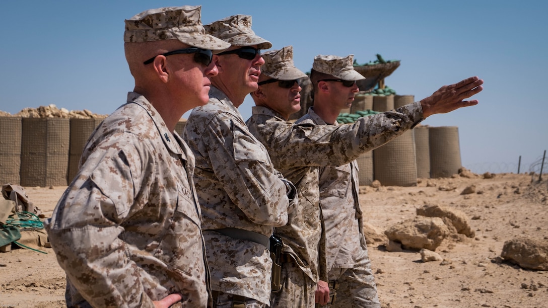 U.S. Marine Corps Col. Paul Nugent (second from right), Task Force Al Asad Commander, gives commanders with Marine Corps Forces Central Command and Special Purpose Marine Air Ground Task Force - Crisis Response - Central Command 16.2 a tour of Al Asad Air Base, Iraq, May 23, 2016. SPMAGTF-CR-CC is deployed with a crisis response mission spanning 20 nations of U.S. Central Command. 