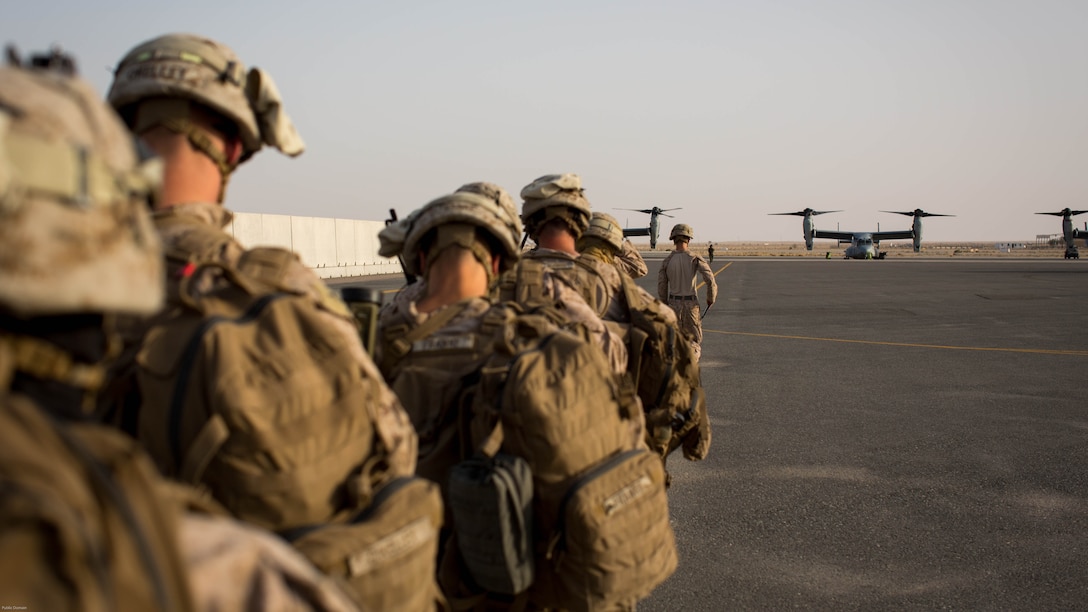 U.S. Marines with 2nd Battalion, 7th Marine Regiment, Special Purpose Marine Air Ground Task Force - Crisis Response - Central Command, walk towards an MV-22 Osprey during a Tactical Recovery of Aircraft and Personnel exercise at an undisclosed location in Southwest Asia, May 23, 2016. SPMAGTF-CR-CC is ready to respond to any crisis response mission in theater to include the employment of a TRAP force. 