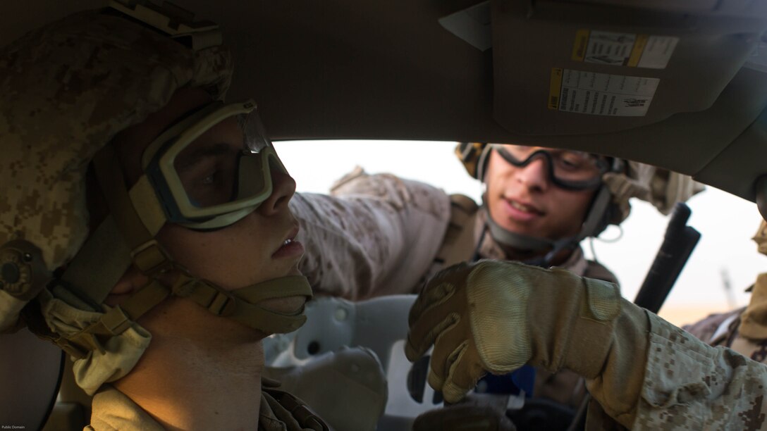 U.S. Marines with 2nd Battalion, 7th Marine Regiment, Special Purpose Marine Air Ground Task Force - Crisis Response - Central Command, put a neck brace on a simulated casualty during a Tactical Recovery of Aircraft and Personnel exercise at an undisclosed location in Southwest Asia, May 23, 2016. SPMAGTF-CR-CC is ready to respond to any crisis response mission in theater to include the employment of a TRAP force.