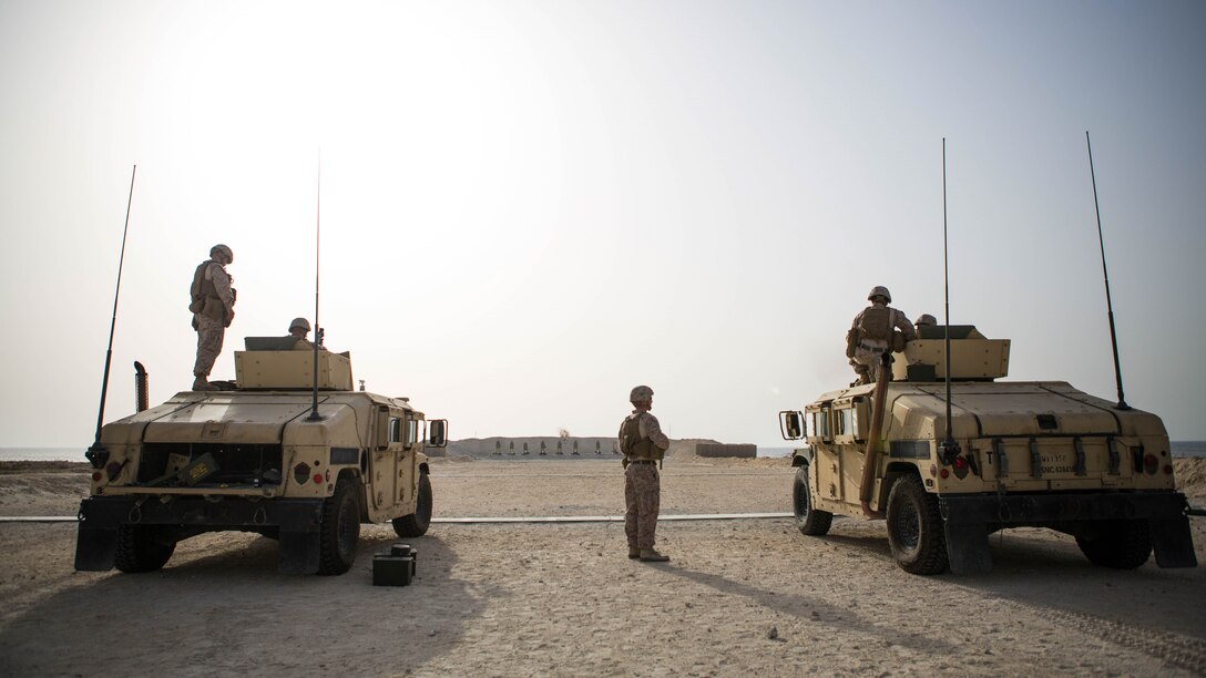 U.S. Marines with Company C, Marine Wing Support Squadron 373, Special Purpose Marine Air Ground Task Force - Crisis Response - Central Command 16.2, engage targets with mounted M240B machine guns during a familiarization range at an undisclosed location in Southwest Asia, June 8, 2016. SPMAGTF-CR-CC is forward deployed in several host nations, with the ability to respond to a variety of contingencies rapidly and effectively. 