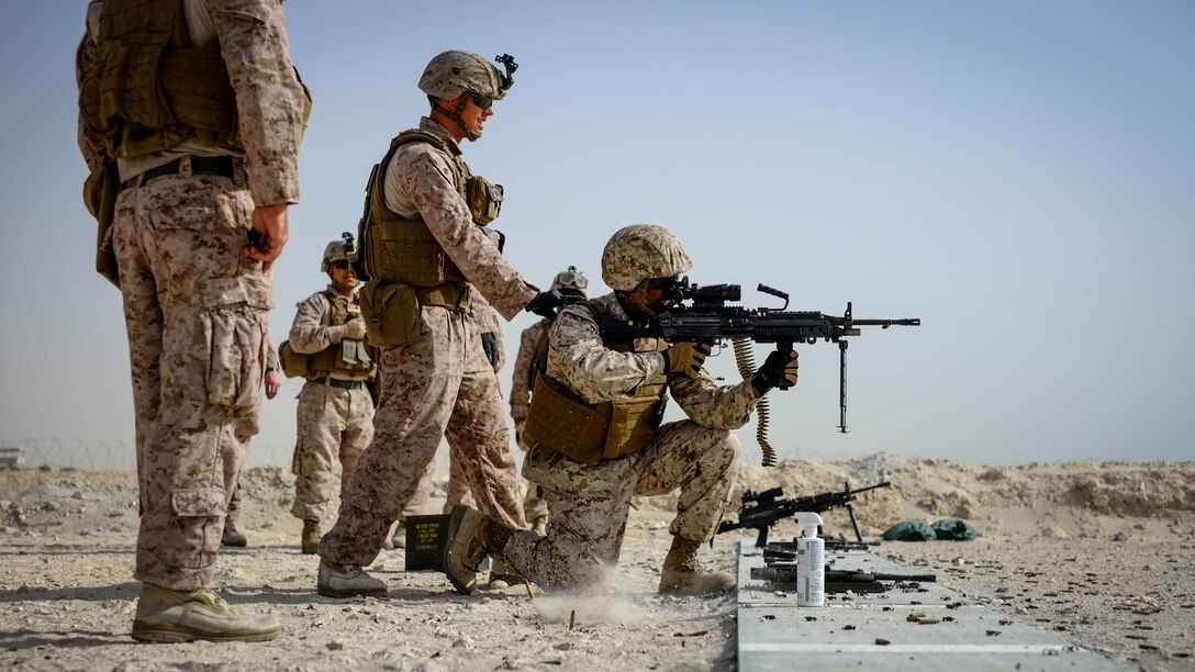U.S. Navy Lt. Shane Joseph, the aviation combat element surgeon with Marine Wing Support Squadron 373, Special Purpose Marine Air Ground Task Force - Crisis Response - Central Command 16.2, fires an M249 light machine gun from the kneeling position during a familiarization range at an undisclosed location in Southwest Asia, June 8, 2016. SPMAGTF-CR-CC is forward deployed in several host nations, with the ability to respond to a variety of contingencies rapidly and effectively. 