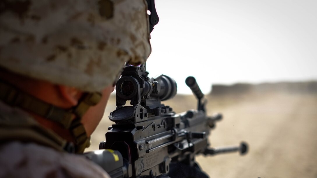 A U.S. Marine with Company C, Marine Wing Support Squadron 373, Special Purpose Marine Air Ground Task Force - Crisis Response - Central Command 16.2, fires an M249 light machine gun during a familiarization range at an undisclosed location in Southwest Asia, June 8, 2016. SPMAGTF-CR-CC is forward deployed in several host nations, with the ability to respond to a variety of contingencies rapidly and effectively.
