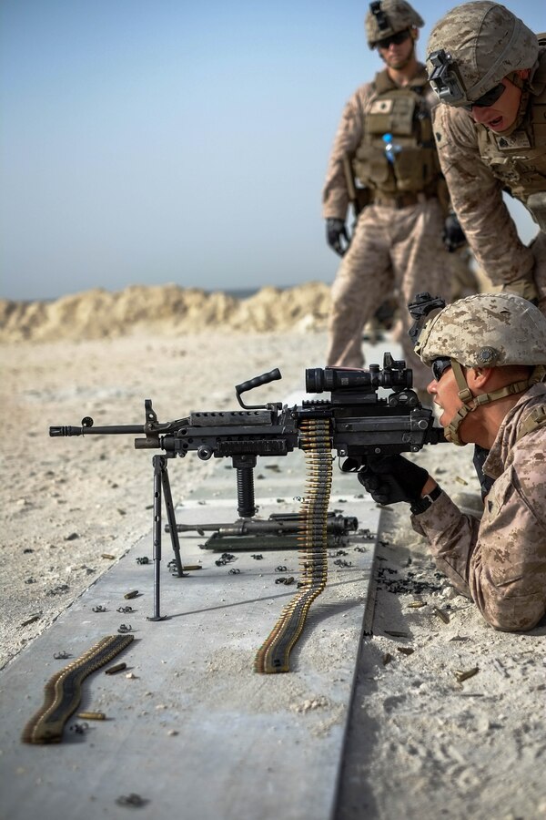 U.S. Marine Corps Cpl. Adan Garcia, a fire team leader with Company C, Marine Wing Support Squadron 373, Special Purpose Marine Air Ground Task Force - Crisis Response - Central Command 16.2, fires an M249 light machine gun during a familiarization range at an undisclosed location in Southwest Asia, June 8, 2016. SPMAGTF-CR-CC is forward deployed in several host nations, with the ability to respond to a variety of contingencies rapidly and effectively. 