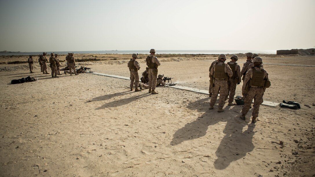 U.S. Marines with Company C, Marine Wing Support Squadron 373, Special Purpose Marine Air Ground Task Force - Crisis Response - Central Command 16.2, operate M249 light machine guns during a familiarization range at an undisclosed location in Southwest Asia, June 8, 2016. SPMAGTF-CR-CC is forward deployed in several host nations, with the ability to respond to a variety of contingencies rapidly and effectively.