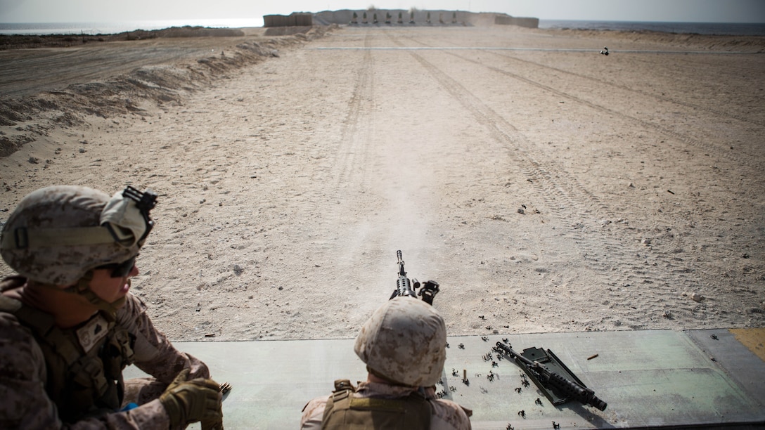 U.S. Marine Corps Cpl. Kyle Hancock, a fire team leader with Company C, Marine Wing Support Squadron 373, Special Purpose Marine Air Ground Task Force - Crisis Response - Central Command 16.2, fires an M249 light machine gun during a familiarization range at an undisclosed location in Southwest Asia, June 8, 2016. SPMAGTF-CR-CC is forward deployed in several host nations, with the ability to respond to a variety of contingencies rapidly and effectively. 
