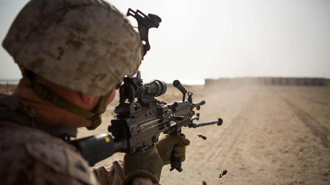 U.S. Marine Corps Cpl. Kyle Hancock, a fire team leader with Company C, Marine Wing Support Squadron 373, Special Purpose Marine Air Ground Task Force - Crisis Response - Central Command 16.2, fires an M249 light machine gun during a familiarization range at an undisclosed location in Southwest Asia, June 8, 2016. SPMAGTF-CR-CC is forward deployed in several host nations, with the ability to respond to a variety of contingencies rapidly and effectively. 