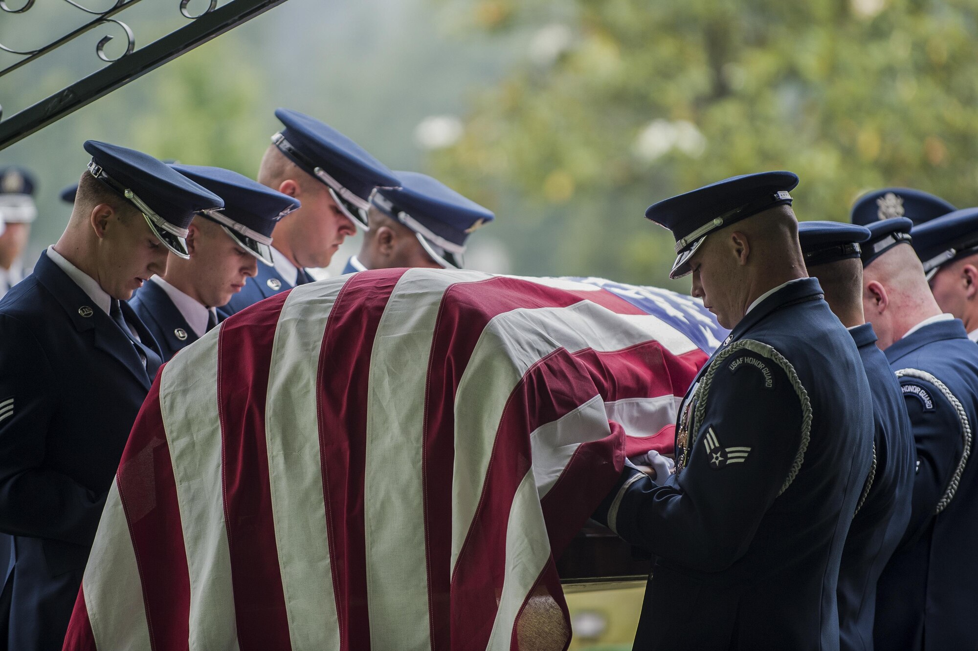 U.S. Air Force Honor Guard members carry the casket of Lt. Col. William “Bill” Schroeder, during his interment, June 16, 2016, at Arlington Nation Cemetery, Virginia. Schroeder, 39, was a special operations weather officer who identified a perilous situation and reacted swiftly by putting himself between an armed individual and his first sergeant. In the process, he saved lives of other squadron members while being fatally wounded. (U.S. Air Force photo by Airman 1st Class Philip Bryant) 
