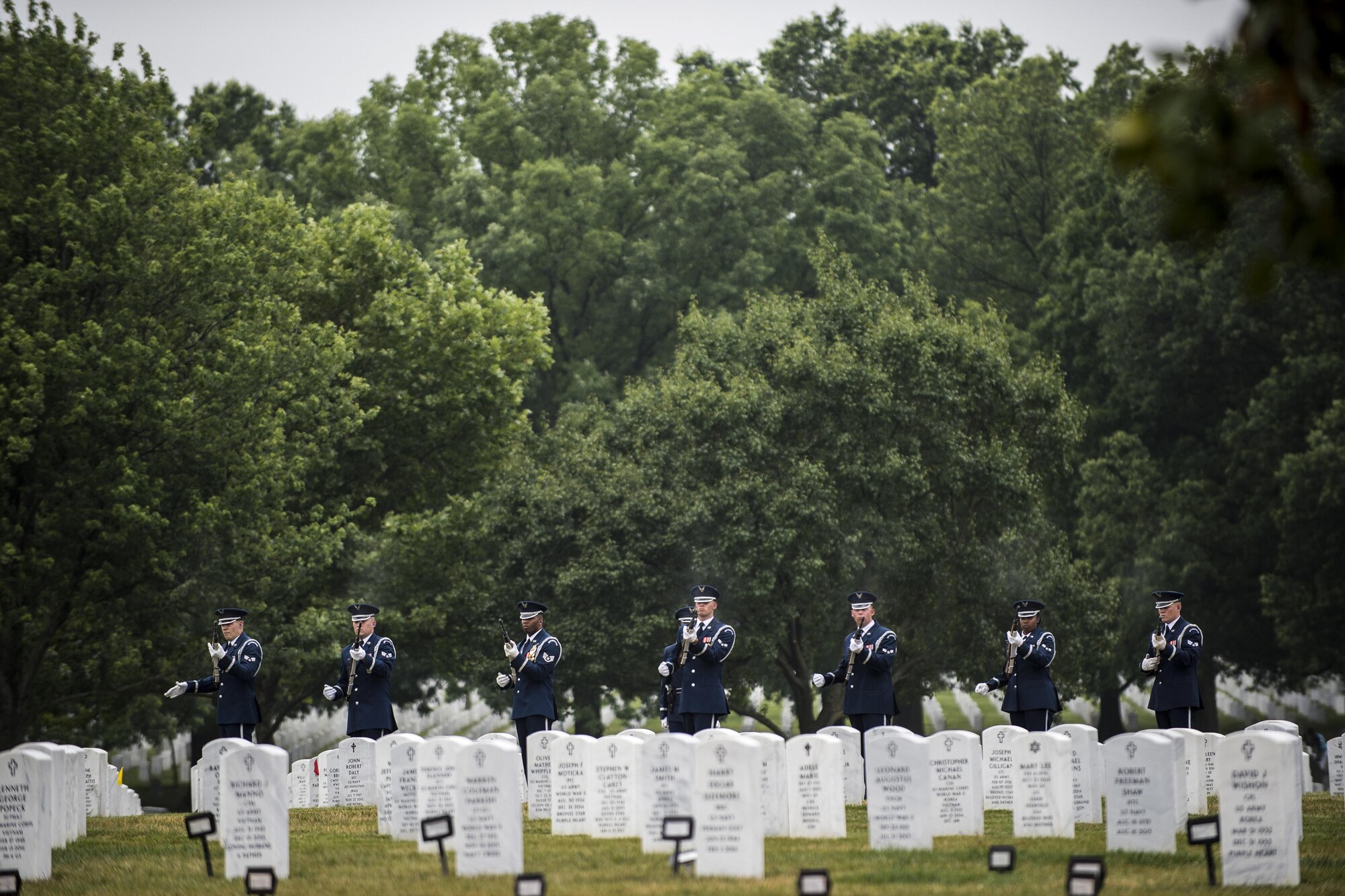 U.S. Air Force Honor Guard members fire a twenty-one gun salute during Lt. Col. William “Bill” Schroeder’s interment ceremony, June 16, 2016, at Arlington National Cemetery, Virginia. Schroeder, 39, was a special operations weather officer who identified a perilous situation and reacted swiftly by putting himself between an armed individual and his first sergeant. In the process, he saved lives of other squadron members while being fatally wounded. (U.S. Air Force photo by Airman 1st Class Philip Bryant)