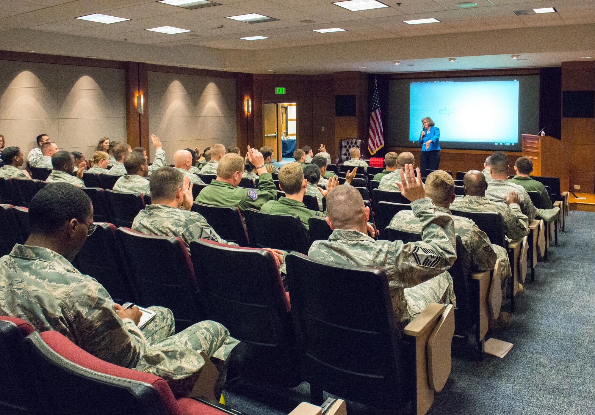 Mrs. Holly Petraeus speaks during her town hall meeting at Travis Air Force Base, Calif. Mrs. Holly Petraeus is the Director of the Consumer Financial Protection Bureau Office of Servicemember Affairs and travels throughout military installations sharing information about financial issues of servicemembers and the actions underway to protect them from business practices that potentially harm their financial stability, Jun 15, 2016. (U.S. Air Force photo by Louis Briscese/Released)