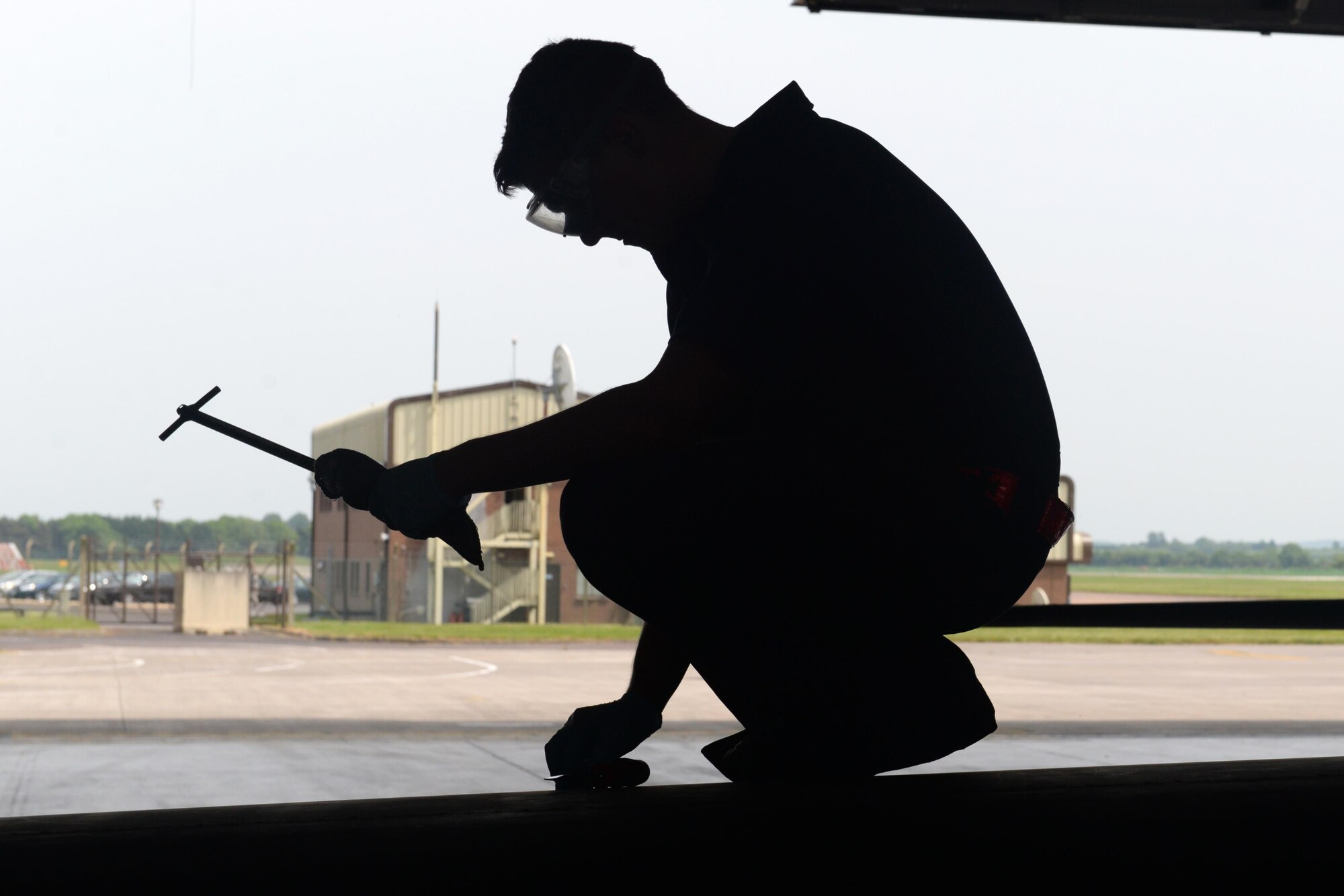 Airman 1st Class Aaron Nymeyer, 9th Aircraft Maintenance Squadron U-2 Dragon Lady dedicated crew chief, checks fuel levels of an aircraft June 7, 2016, at Royal Air Force Fairford, Gloucestershire, England. Nymeyer was a member of Beale's en route recovery team (ERT), at RAF Fairford, which transitions aircraft from and to Beale Air Force Base, California, and forward operating locations (FOL). The ERT is used like a pit crew at the midway point in Fairford, ensuring the aircraft are prepared to make it to their next destination. (U.S. Air Force photo by Senior Airman Ramon A. Adelan)