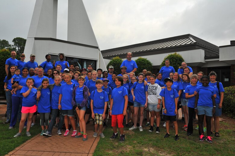 Hurlburt Field’s Special Operations Youth Group pose for a group photo outside of the chapel at Hurlburt Field, Fla., June 16, 2016. The group performed service and repair work at the Airman & Family Readiness Center, library, youth center, child development center, base pool and chapel, along with multiple off-base sites. (U.S. Air Force photo by Airman 1st Class Joseph Pick)
