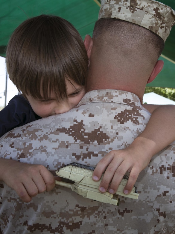 Gunnery Sgt. Ira Heide works hard to balance his duties as a Marine and his obligations as a single parent. He has served as a Marine for 16 years and as a father for seven to his son, Jessen.