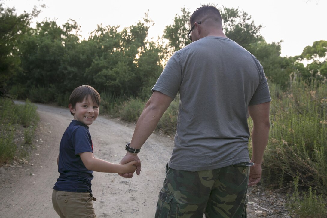 Gunnery Sgt. Ira Heide works hard to balance his duties as a Marine and his obligations as a single parent. He has served as a Marine for 16 years and as a father for seven to his son, Jessen.