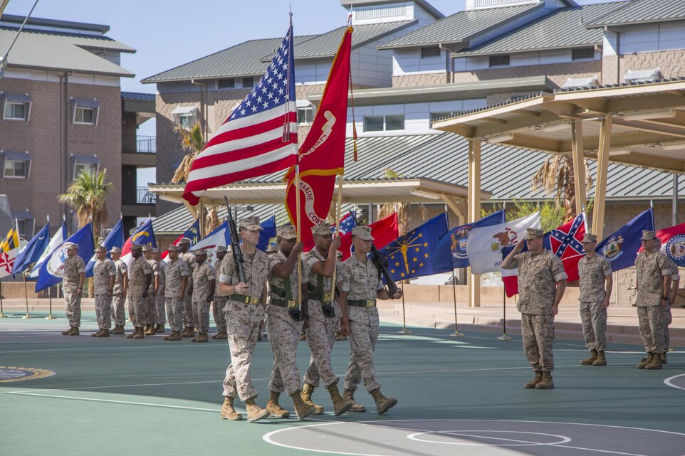 The Marine Corps Logistics and Operations Group color guard takes its position during the unit’s change of command ceremony at the Dunham Amphitheater aboard the Marine Corps Air Ground Combat Center, Twentynine Palms, Calif., June 13, 2016. During the ceremony, Col. Matthew Cook relinquished command of MCLOG to Col. Jason Beaudoin. (Official Marine Corps photo by Lance Cpl. Alysa Jesse/Released)