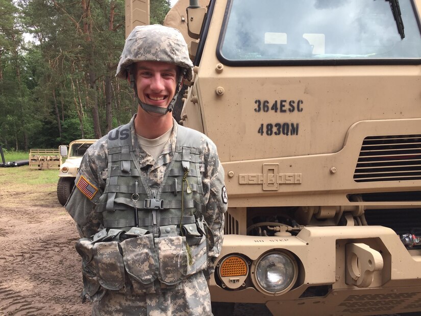 U.S. Army Reserve Pfc. James Hale, a Transportation Management Coordinator with the 3882nd Combat Sustainment Support Battalion, Joint Base Lewis-McChord, Washington, is interviewed by a Polish television reporter during Exercise Anakonda 2016 at the Drawsko Pomorskie Training Area, Poland, June 14. Hale, the son of American missionaries, was born in Poland and has lived most of his life there. He has served as a Polish translator for the soldiers in his unit during their time in Poland. Exercise Anakonda 2016 is a Polish-led, joint multinational exercise taking place throughout Poland June 7-17. The exercise involves approximately 31,000 participants from more than 20 nations. Exercise Anakonda 2016 is a premier training event for U.S. Army Europe and participating nations and demonstrates the United States and partner nations can effectively unite under a unified command while training on contemporary scenario. (U.S. Army photo by Timothy L. Hale) (Released)