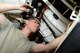 Staff Sgt. Nicholas Ensminger, 56th Equipment Maintenance Squadron inspection section team member, inspects the hydraulic lines on an F-16 Fighting Falcon landing gear subsystem June 15, 2016, at Luke Air Force Base, Ariz. The inspection section thoroughly inspects aircraft for discrepancies, fix then ops check all major systems and subsystems, and return safe and reliable aircraft back  for another 400 hours of training the world's greatest F-16 fighter pilots. (U.S. Air Force photo by Tech. Sgt. Timothy Boyer)