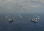 PHILLIPINE SEA (June 18, 2016) - The Nimitz-class aircraft carriers USS John C. Stennis (CVN 74) and USS Ronald Reagan (CVN 76) conduct dual aircraft carrier strike group operations in the U.S. 7th Fleet area of operations in support of security and stability in the Indo-Asia-Pacific. The operations mark the U.S. Navy’s continued presence throughout the area of responsibility.  (U.S. Navy photo by Mass Communication Specialist 3rd Class Jake Greenberg / Released)