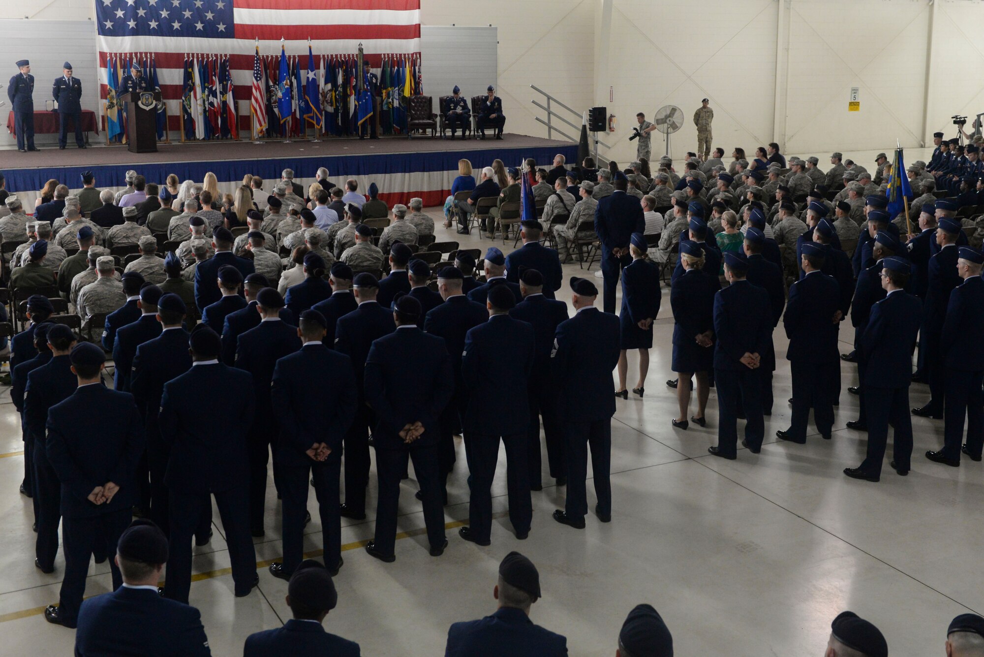 Members from the 91st Missile Wing and the 5th Bomb Wing at Minot Air Force Base, N.D., gather in the Defender Dome to celebrate the 91st MW change of command ceremony June 17, 2016. Col. Colin Connor accepted command of the 91st MW from Col. Michael Lutton. (U.S. Air Force photo/Airman 1st Class Jessica Weissman)