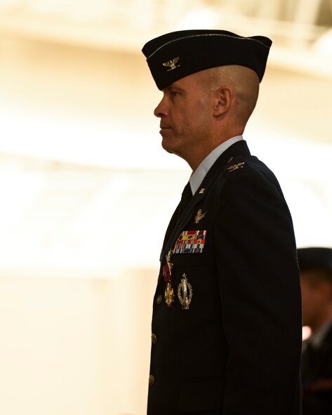 Col. Michael Lutton relinquishes his command during the 91st Missile Wing change of command ceremony at Minot Air Force Base, N.D., June 17, 2016. Col. Colin Connor, 91st MW commander, came from the Pentagon serving as a Chief of Staff of the Air Force Fellow. (U.S. Air Force photo/Airman 1st J.T. Armstrong)