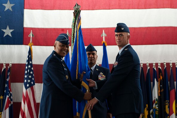 Col. Colin Connor accepts command of the 91st Missile Wing during the 91st MW change of command ceremony at Minot Air Force Base, N.D., June 17, 2016. Connor is the 32nd commander of the 91st MW. (U.S. Air Force photo/Senior Airman Kristoffer Kaubisch)