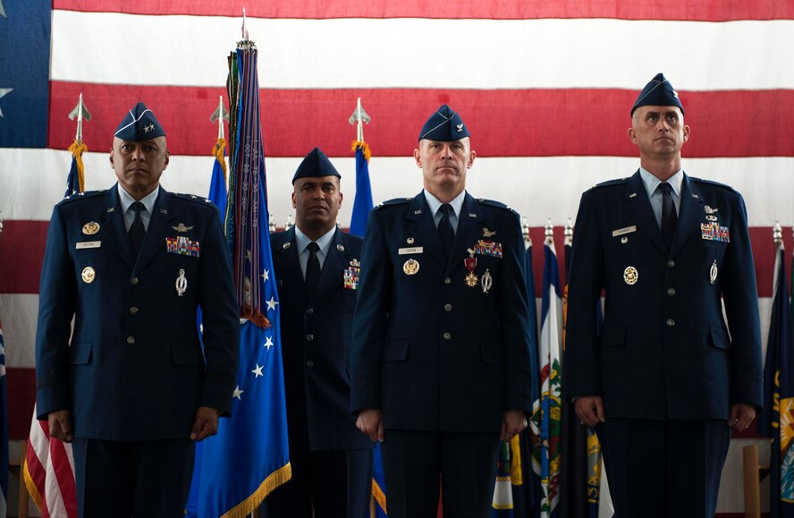 The official party stands at attention during the 91st MW change of command ceremony at Minot Air Force Base, N.D., June 17, 2016. Col. Collin Connor took command from Michael Lutton. (U.S. Air Force photo/Senior Airman Kristoffer Kaubisch)