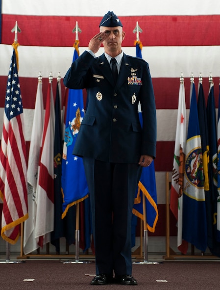 Col. Colin Connor gives his first salute as 91st Missile Wing commander during the 91st MW change of command ceremony at Minot Air Force Base, N.D., June 17, 2016. Connor came from the Pentagon, Washington, D.C., serving as the Chief of Staff of the Air Force Fellow. (U.S. Air Force photo/Senior Airman Kristoffer Kaubisch)