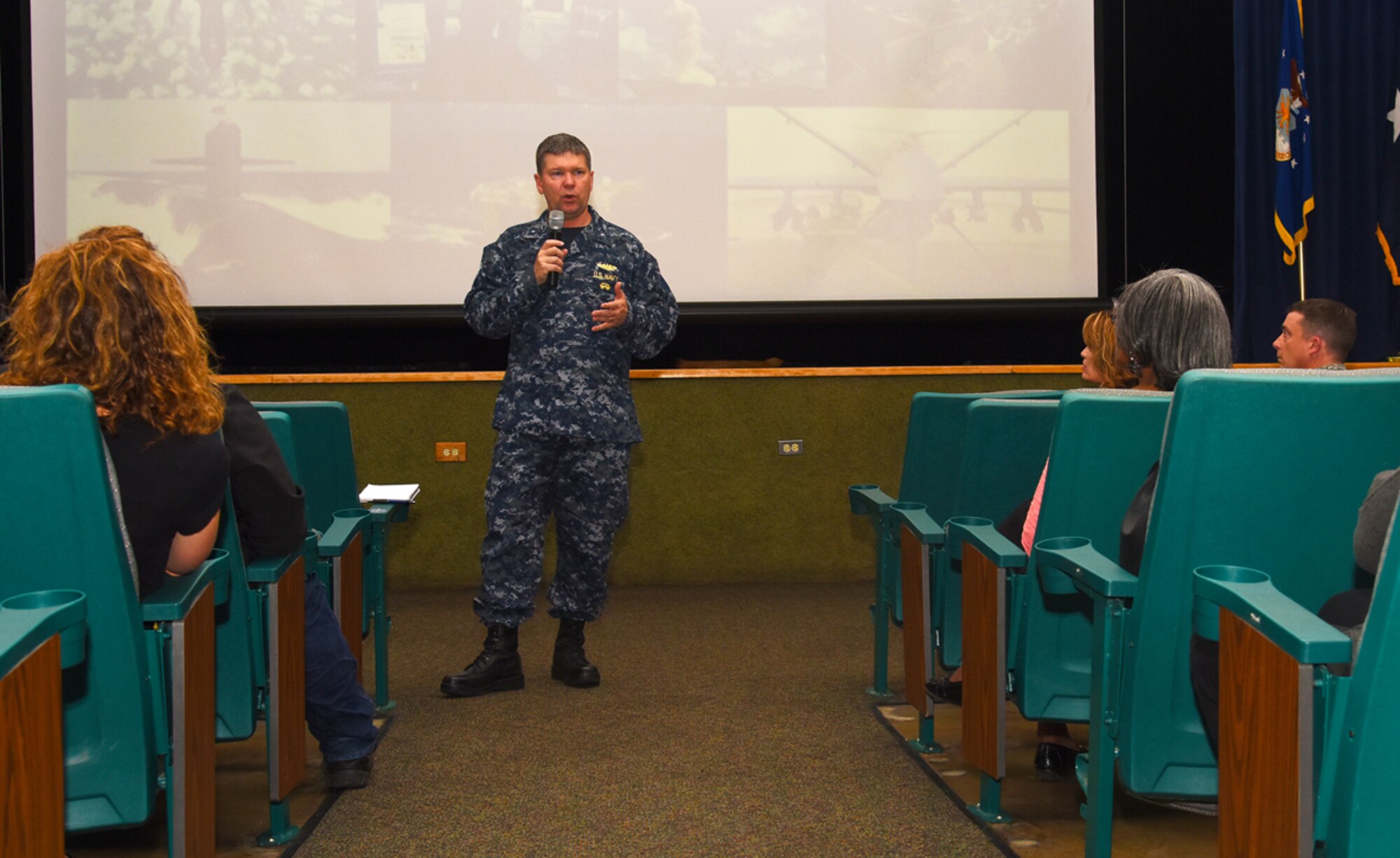 U.S. Navy Rear Adm. Thomas Ishee, U.S. Strategic Command’s (USSTRATCOM) Joint Functional Component Command for Global Strike deputy commander, speaks with spouses during a town hall meeting, June 7, 2016, at Malmstrom Air Force Base, Mont. During the event, which was held in conjunction with a U.S. Strategic Command Road Show, Ishee talked about Malmstrom’s role in strategic deterrence, new threats in the world and how we maintain nuclear forces. The road show is a USSTRATCOM outreach effort designed to show service members how their role fits into USSTRATCOM’s strategic deterrence mission. One of nine DoD unified combatant commands, USSTRATCOM has global strategic missions, assigned through the Unified Command Plan, which include strategic deterrence; space operations; cyberspace operations; joint electronic warfare; global strike; missile defense; intelligence, surveillance and reconnaissance; combating weapons of mass destruction; and analysis and targeting. (U.S. Air Force photo/Senior Airman Jaeda Tookes) 