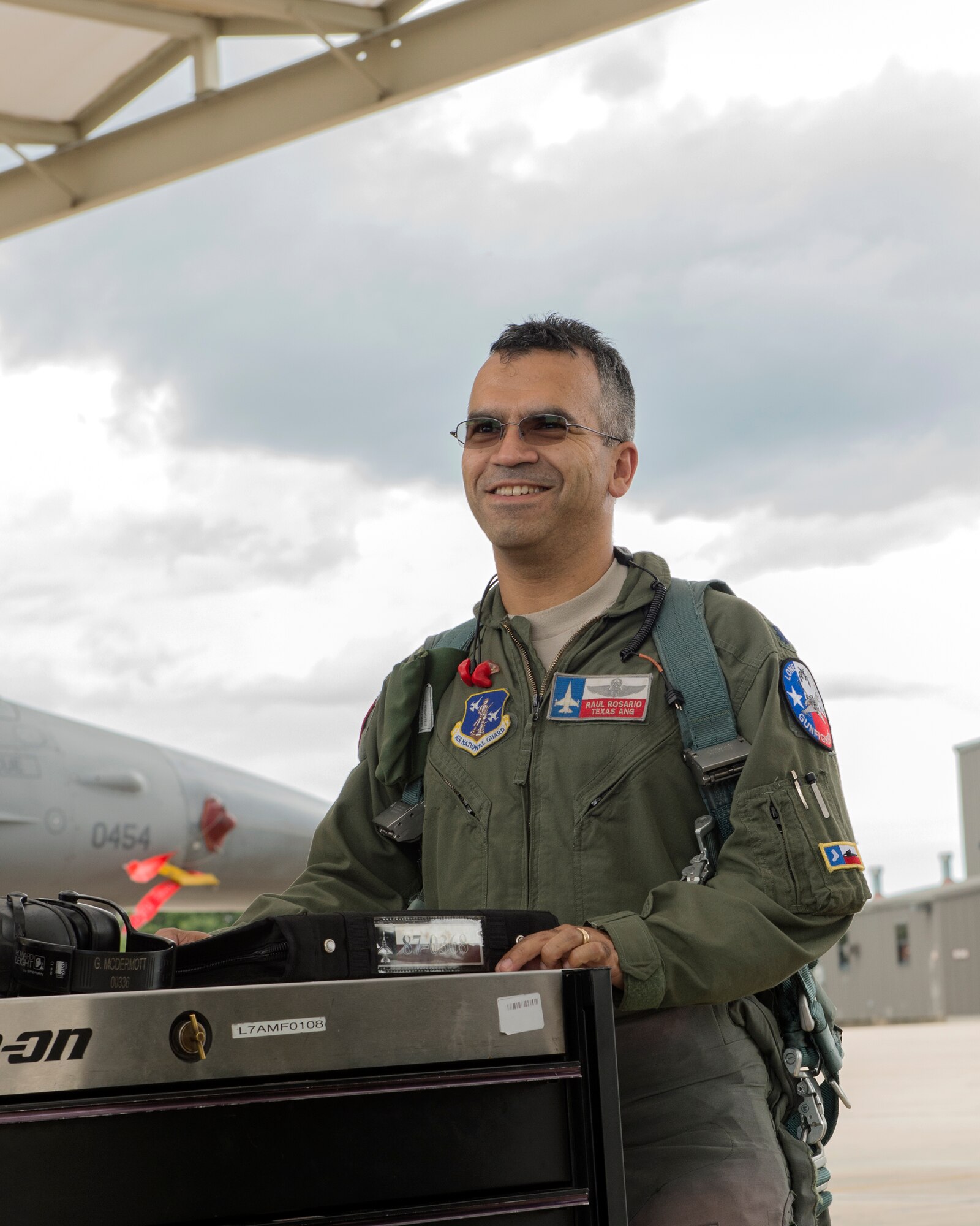 Col. Raul Rosario, newly selected as the 149th Operations Group commander, talks to some members from the 149th Maintenance Group on the flight line after performing routine flying operations June 3, 2016. Rosario is also an F-16 instructor pilot with the 149th Fighter Wing, Texas Air National Guard, at Joint Base San Antonio-Lackland, Texas. 