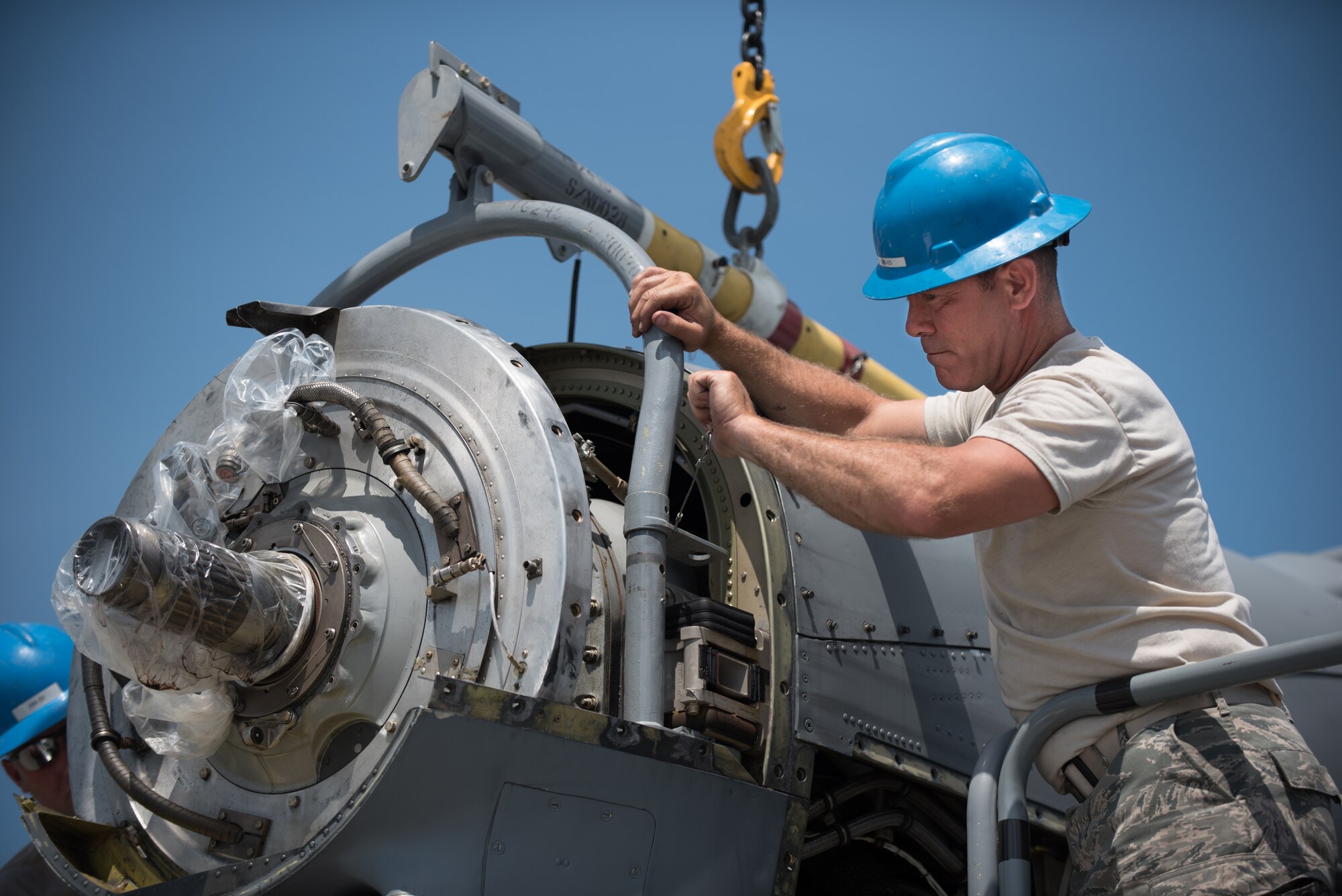 U.S. Air Force Tech. Sgt. Alan Broadus, a propulsion mechanic from the Kentucky Air National Guard’s 123rd Airlift Wing, removes an engine from a C-130 Hercules aircraft at the Air National Guard’s Air Dominance Center in Savannah, Ga., June 15, 2016. Broadus is attending Maintenance University here, a weeklong course designed to provide intensive instruction in aircraft maintenance. Now in its eighth year, Maintenance University is sponsored by the 123rd Airlift Wing. (U.S. Air National Guard photo by Lt. Col. Dale Greer)