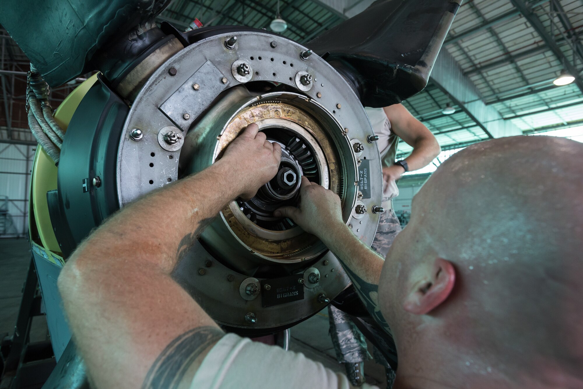 U.S. Air Force Staff Sgt. Michael Marks, a propulsion mechanic from the Kentucky Air National Guard’s 123rd Airlift Wing, mounts a propeller to a C-130 engine at the Air National Guard’s Air Dominance Center in Savannah, Ga., June 15, 2016. Marks is attending Maintenance University here, a weeklong course designed to provide intensive instruction in aircraft maintenance. Now in its eighth year, Maintenance University is sponsored by the 123rd Airlift Wing. (U.S. Air National Guard photo by Lt. Col. Dale Greer)