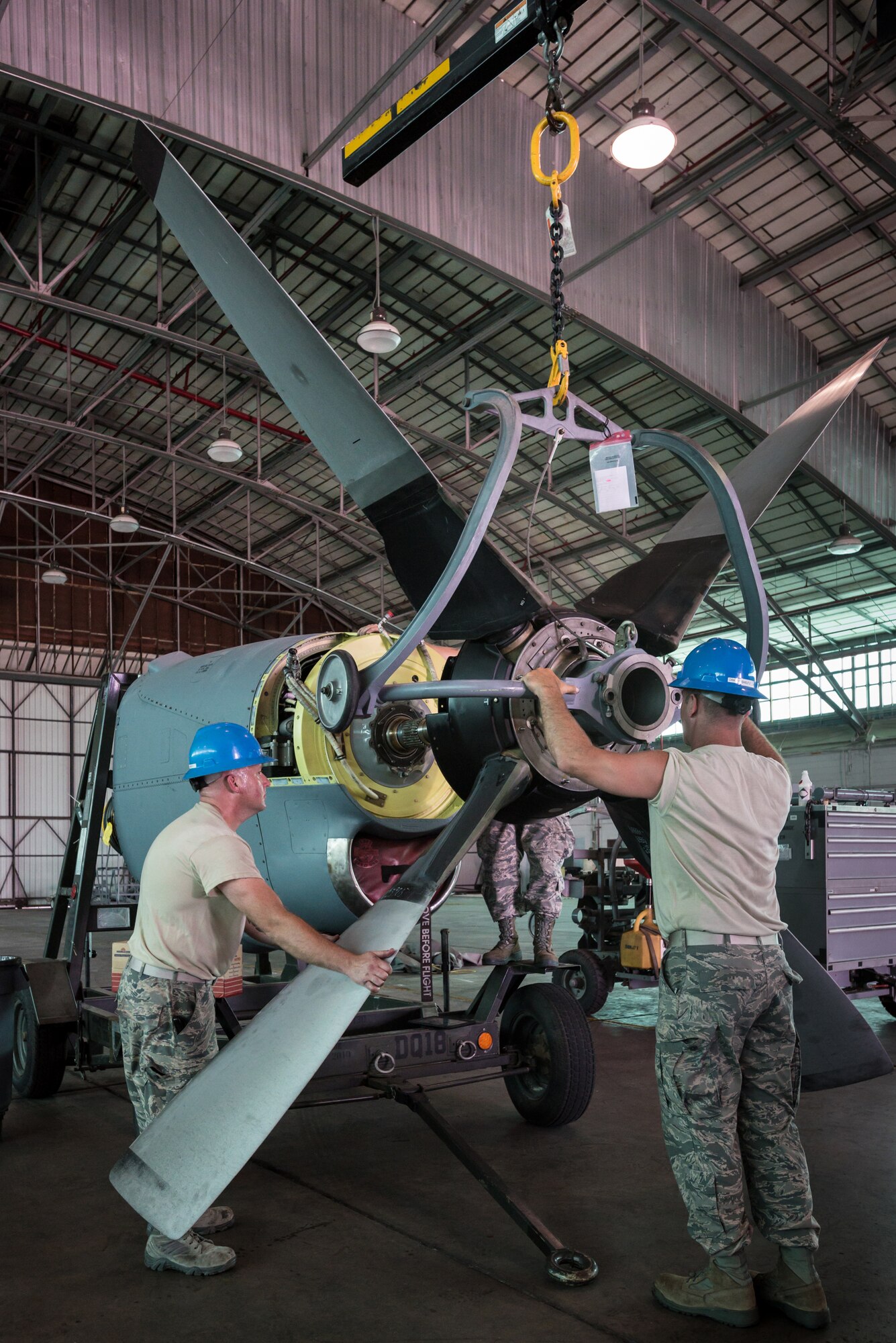 U.S. Air Force Staff Sgt. Michael Marks (left) and U.S. Air Force Tech. Sgt. Alan Broadus, propulsion mechanics from the Kentucky Air National Guard’s 123rd Airlift Wing, mount a propeller to a C-130 engine at the Air National Guard’s Air Dominance Center in Savannah, Ga., June 15, 2016. Both Airmen are attending Maintenance University here, a weeklong course designed to provide intensive instruction in aircraft maintenance. Now in its eighth year, Maintenance University is sponsored by the 123rd Airlift Wing. (U.S. Air National Guard photo by Lt. Col. Dale Greer)
