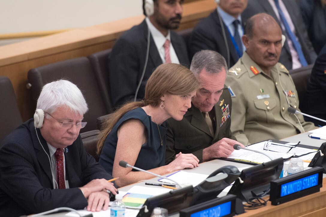 Marine Corps Gen. Joe Dunford, chairman of the Joint Chiefs of Staff, confers with Samantha Power, U.S. Ambassador to the United Nations, during a meeting on peacekeeping at the United Nations in New York City, June 17, 2016. It was Dunford’s first visit to the U.N. since becoming chairman. DoD photo by Navy Petty Officer 2nd Class Dominique A. Pineiro
