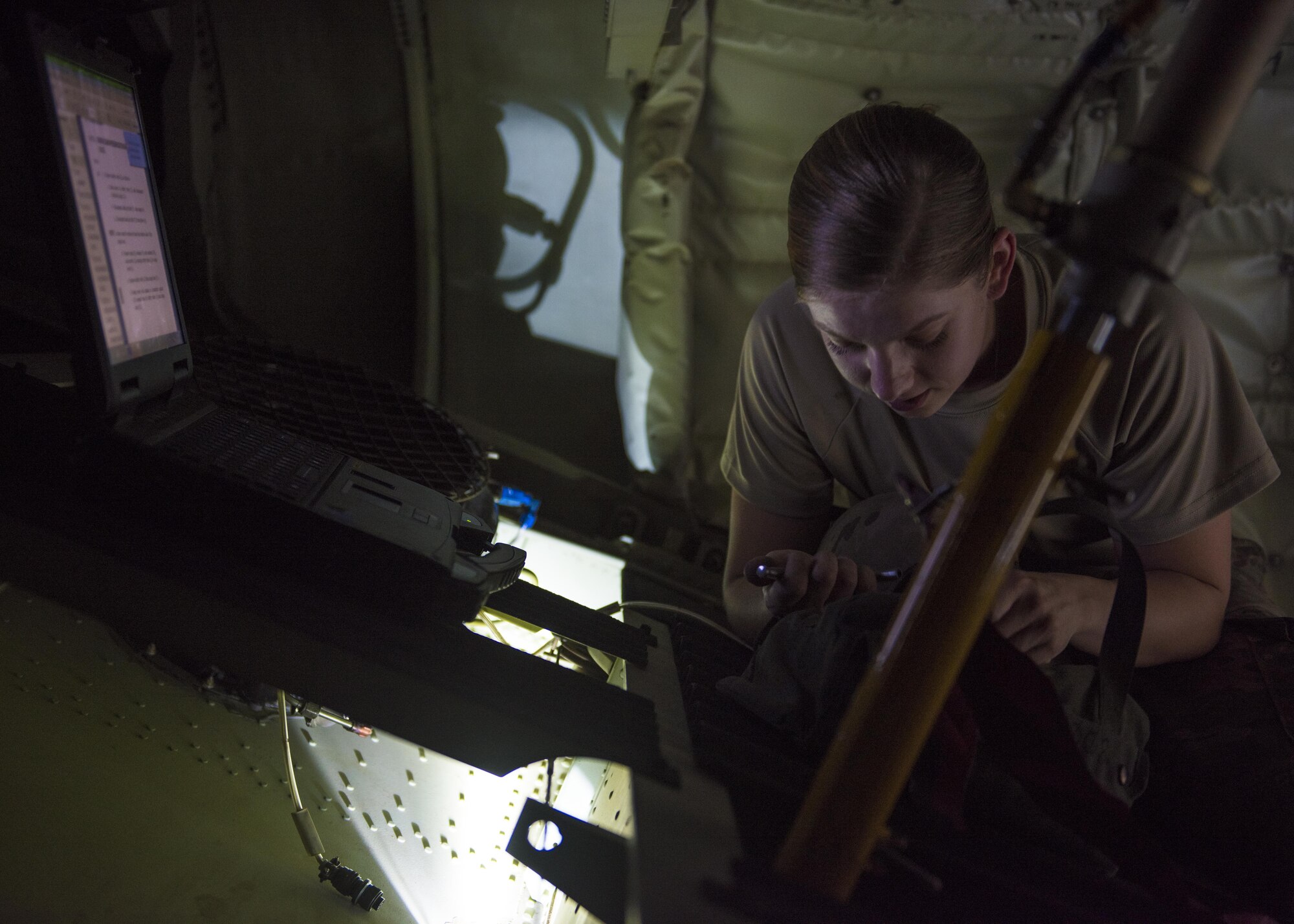 Senior Airman Ashley Frey, 455th Expeditionary Aircraft Maintenance Squadron crew chief, fits the correct tool to replace a safety valve in a C-130J Super Hercules, June 15, 2016, Bagram Airfield, Afghanistan. Crew chiefs are tasked to advise on problems for maintaining, servicing and inspecting aircraft and use technical data to diagnose and solve maintenance problems on aircraft systems. (U.S. Air Force photo by Senior Airman Justyn M. Freeman)