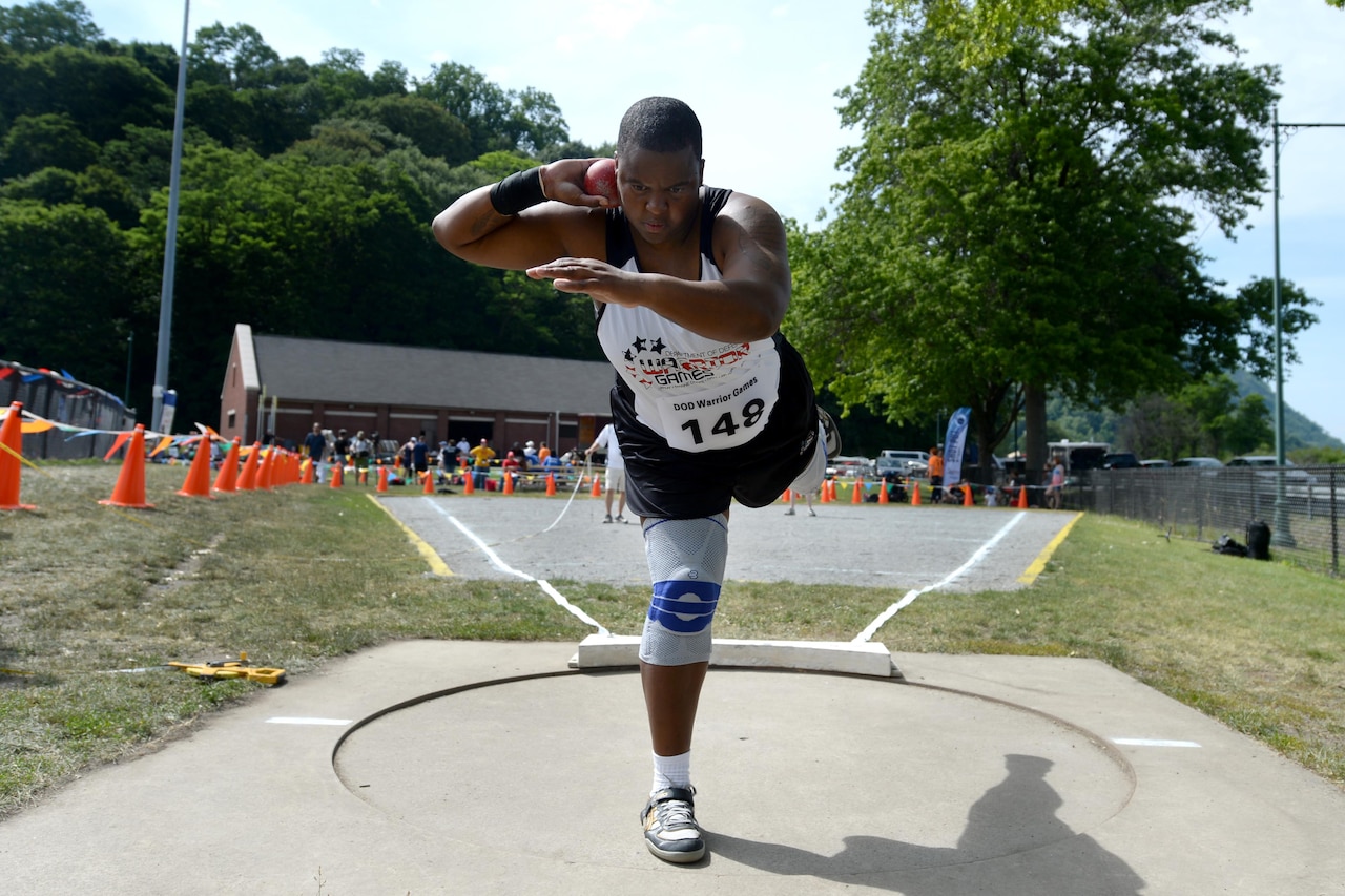 Army veteran Sgt. Monica Southall throws the shot put during the 2016 Department of Defense Warrior Games held at the U.S. Military Academy in West Point, N.Y., June 16, 2016. DoD photo by EJ Hersom