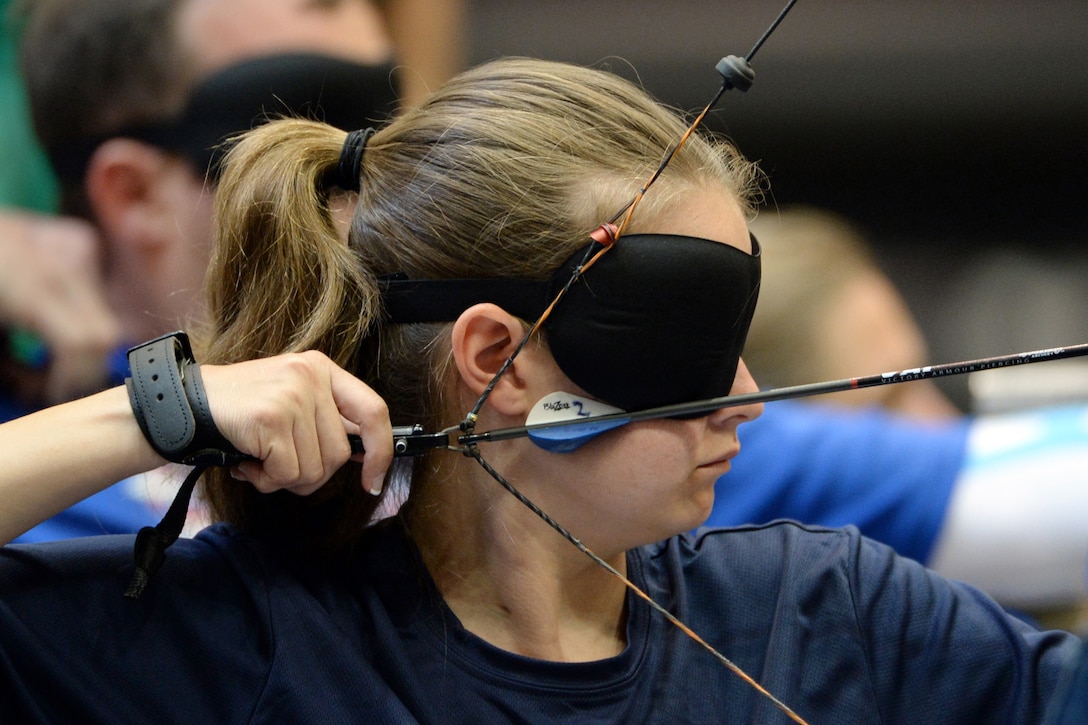 Navy veteran Brittany Jordan competes in the visually impaired archery division of the 2016 Department of Defense Warrior Games at the U.S. Military Academy in West Point, N.Y., June 17, 2016. DoD photo by EJ Hersom